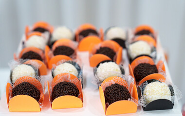 party sweets, chocolate brigadeiro and coconut kiss with condensed milk