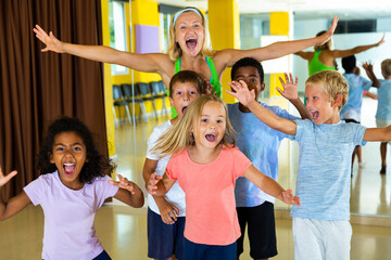 Happy children in dance studio smiling and having fun. High quality photo