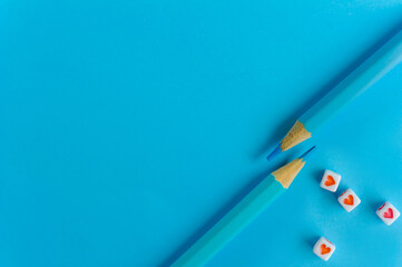 blue color pencil on a blue background