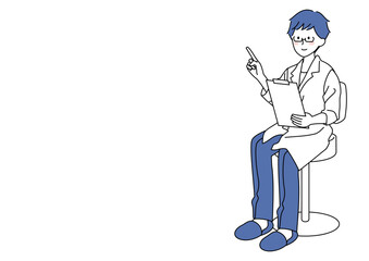 椅子に座り問診や説明をする男性医師