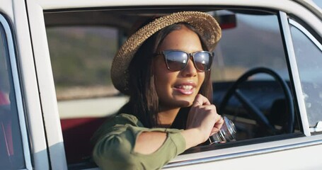Woman taking picture with camera on nature road trip, on holiday in a car and transportation during vacation on travel by the countryside. Travel, happy and free person with freedom in summer