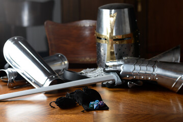 Role Playing Game and  game dice and templar knight armour in the table top game epic play for RPG. ice and fire and dragons and dungeons