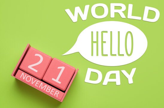 Greeting card for World Hello Day on green background