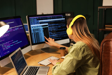 Transgender programmer working in server room