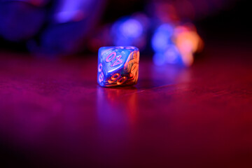 Forge, ice and fire color Role Playing Game and game dice and templar knight armour in the table...
