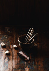 Traditional, handcrafted ceramic. Rustic wooden background. Close up. Copy space.