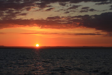 Naklejka na ściany i meble Beautiful sunset over the sea in the bay of La Paz in Mexico