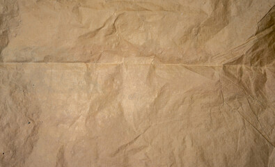 golden old paper with torn and crumpled texture for background