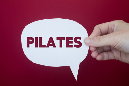 Speech bubble in front of colored background with Pilates text.