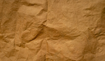 golden old paper with torn and crumpled texture for background
