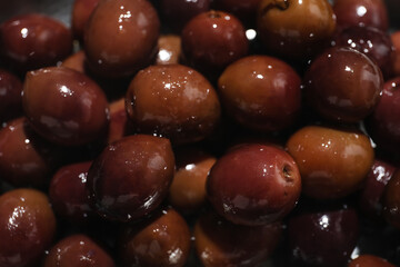 Delicious red olives as background, closeup