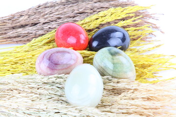 Onyx egg on ears of rice