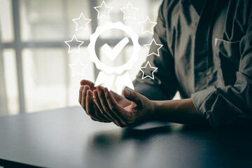 A check mark in hand with a star shows a virtual approved check mark.