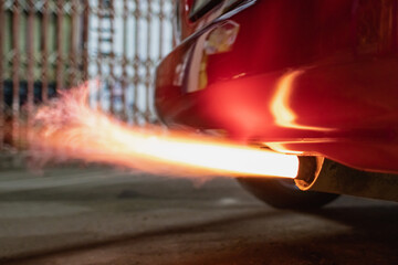Flame coming out of the exhaust pipe - obrazy, fototapety, plakaty