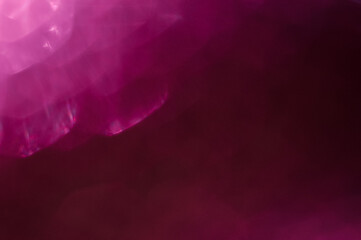 Pink violet abstract background with round bokeh circles