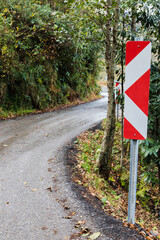 Turn direction, protective road sign, vertical photo