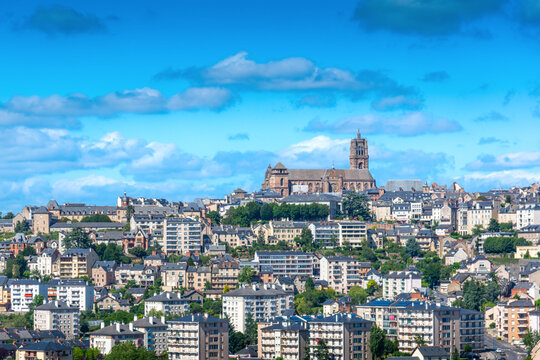 Rodez city view with church and houses during a sunny day