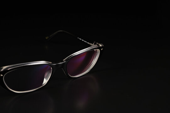 Black background and black glasses