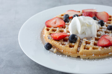 A view of a plate of waffles.