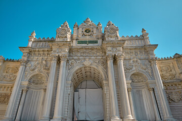 Fototapeta na wymiar Entrance gate of Dolmabahce palace in Istanbul. Low angle view of iconic baroque style gate. 03.03.2021. istanbul. Turkey.