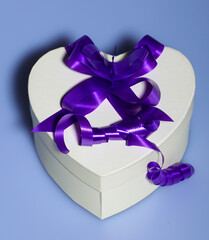 Heart shaped present box with ribbon