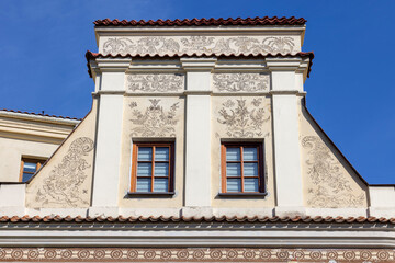 Obraz premium View of the decorative facade of tenement house in the Old Town, Lublin, Poland