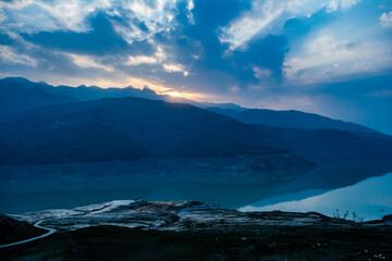 Sunrise view of Tehri mountains. Scenery sunrise over Tehri Lake, Uttarakhand. Tehri Dam, the tallest dam in India and Tehri dam is Asia's largest man-made lake.