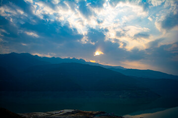 Sunrise view of Tehri mountains. Scenery sunrise over Tehri Lake, Uttarakhand. Tehri Dam, the tallest dam in India and Tehri dam is Asia's largest man-made lake.