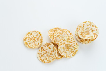 Keripik Tempe or Tempe chips, a typical Indonesian food made from thinly sliced ​​tempeh and then fried using seasoned flour. It's salty and savory. 
