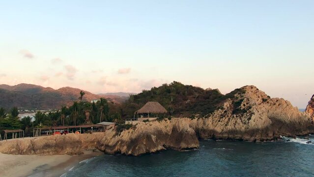Picturesque View Of Playa Maruata On The Coast Of Michoacan In Mexico. aerial drone pullback