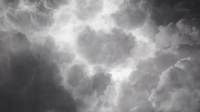 4k view of  lightning flashes among dark cumulonimbus clouds, thunderstorm 4K.