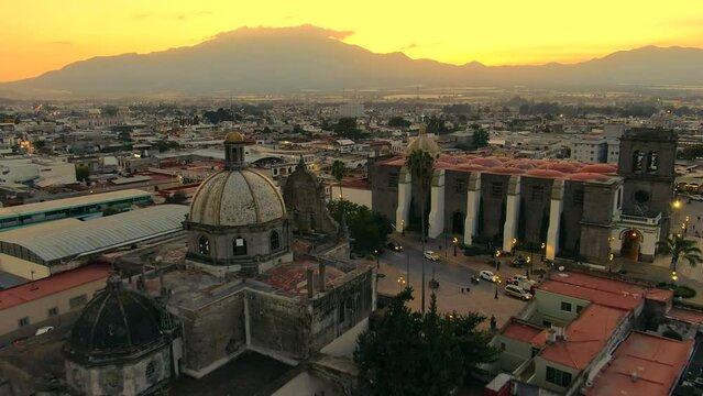 Parroquia del Sagrario And Ciudad Guzman Cathedral During Golden Hour In Jalisco, Mexico. - aerial