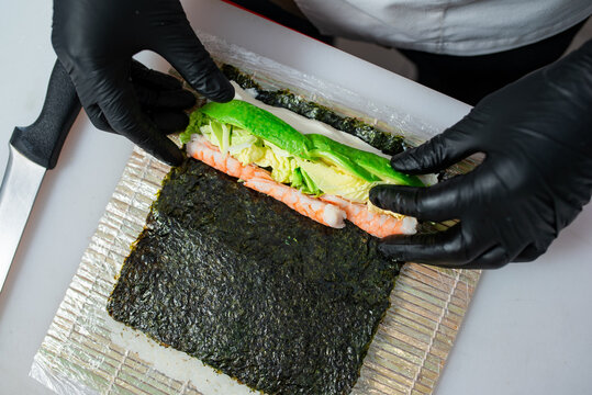 rolls in cheff hand