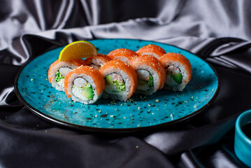 sushi rolls on the blue plate