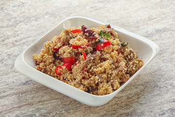 Arabic cous cous with meat and tomato