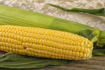 Yellow sweet raw cob corn