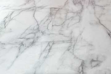 A view of a white marble surface, as a background.