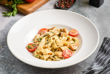 papardelle with porcini mushrooms and tomatoes