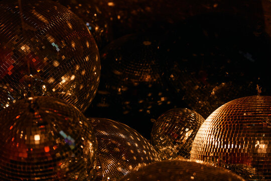Close up sparkly gold disco balls

