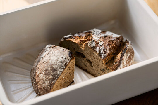 Rustic bread pieces in dish
