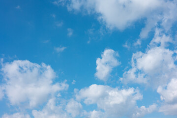 Blue sky with white cirrus and cumulus clouds during summer. Wheater, meterology and heaven.