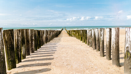 Beach poles on the beach of Domburg, Zeeland, the Netherlands Beach of Zeeland Netherlands on a...