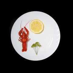 Restaurant serving of a delicacy - boiled red crayfish lobsters on a white plate with symmetry