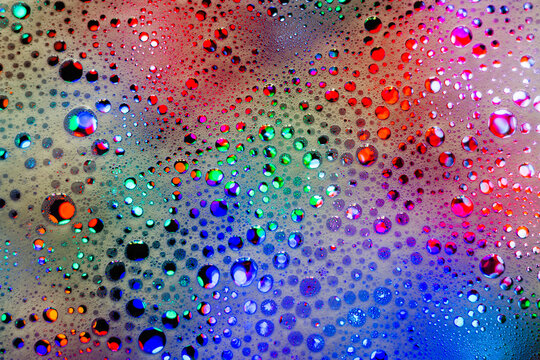 Abstract rainbow background. Colored soap foam texture. Gel foam with bubbles