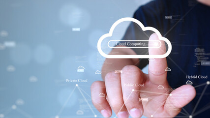 A man is searching for information on cloud computing technology to use. Touching the cloud icon on the right with a fingertip. small binary polygon icon on the background.