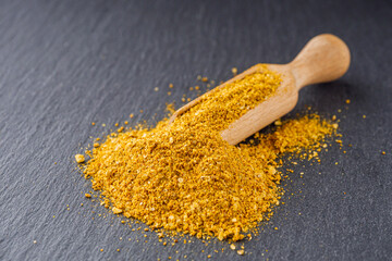 svanetian salt on a black stone background