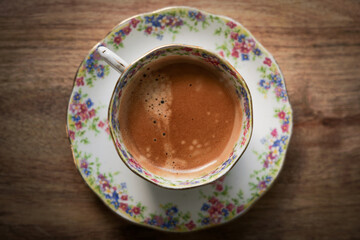 cup of coffee on table in fine china