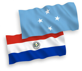 National vector fabric wave flags of Federated States of Micronesia and Paraguay isolated on white background. 1 to 2 proportion.