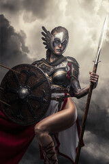 Portrait of warlike goddes dressed in armor and red cloak holding shield and spear.