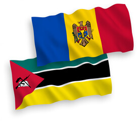 National vector fabric wave flags of Republic of Mozambique and Moldova isolated on white background. 1 to 2 proportion.